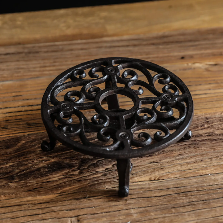 Cast iron tea warmer with burner stand