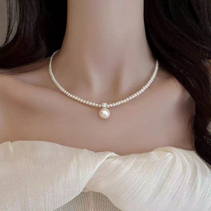 Pearl necklace with silver clasp, pearls 4–12 mm