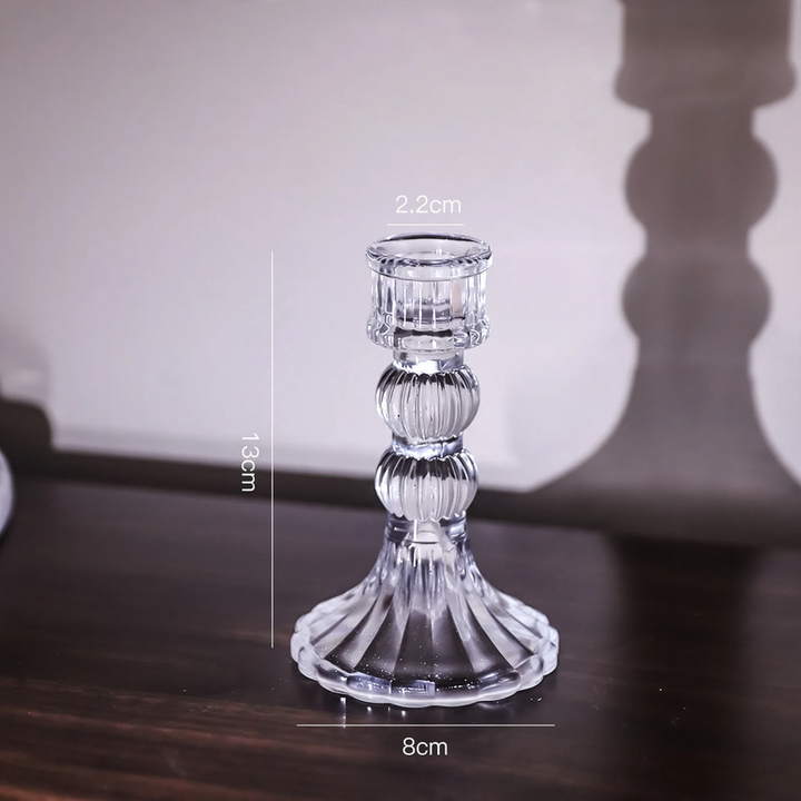 Glass candle holders in various shapes