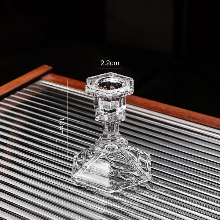 Glass candle holders in various shapes