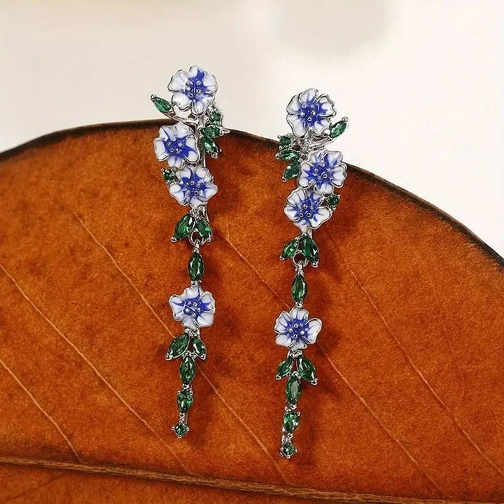 BowLift | Glossy Blue Floral Dangling Earrings