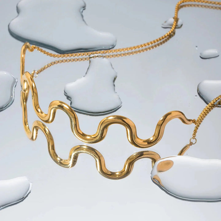 BowLift | Gold Wavy Statement Bracelet and Necklace