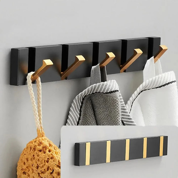 BowLift | HOOKLUX – Foldable wall hook strip made of aluminum, space-saving & versatile