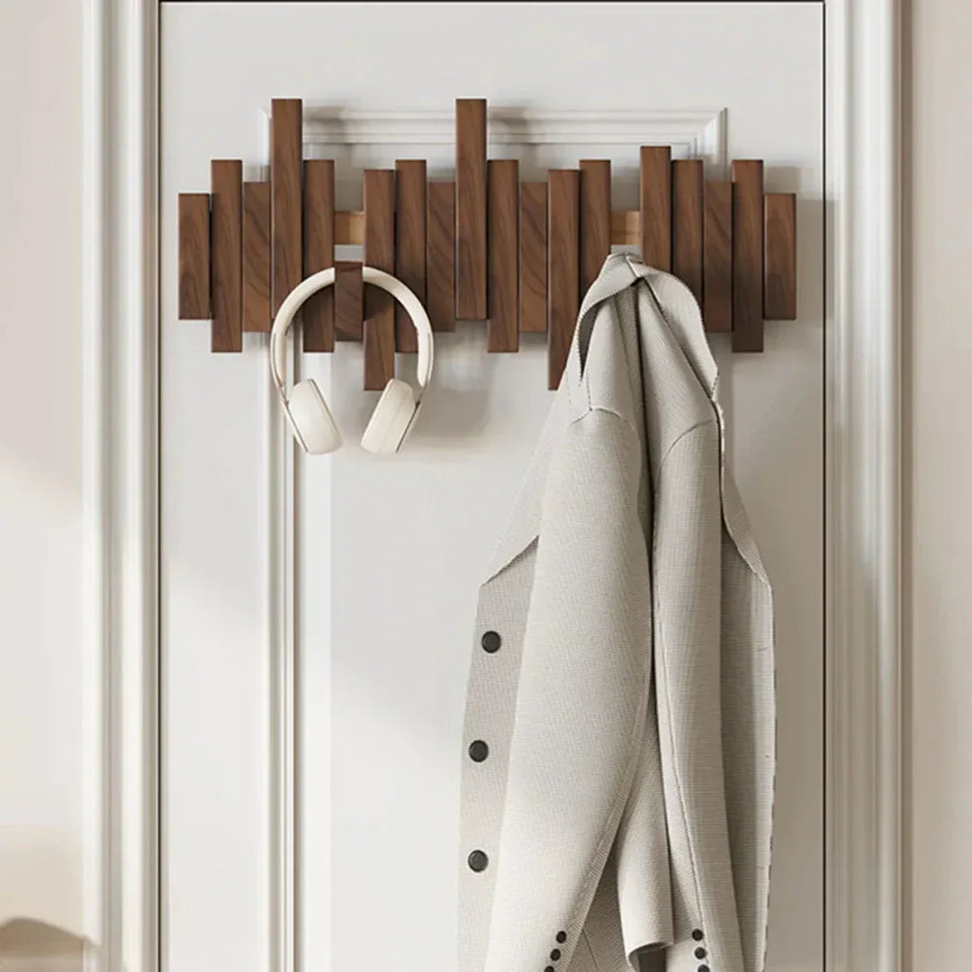 BowLift | Modern piano-style hanger made of walnut and beech wood