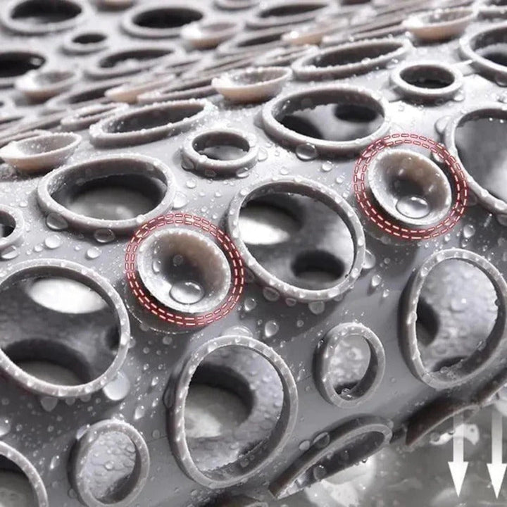 Shower mat with suction cups and drainage holes | Bowlift