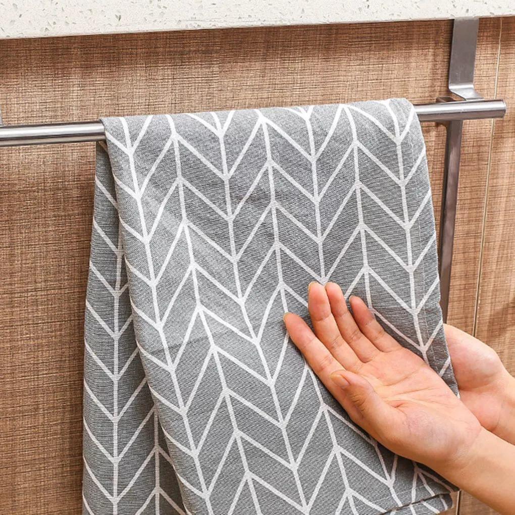 BowLift | Towel holder made of stainless steel for cabinet doors