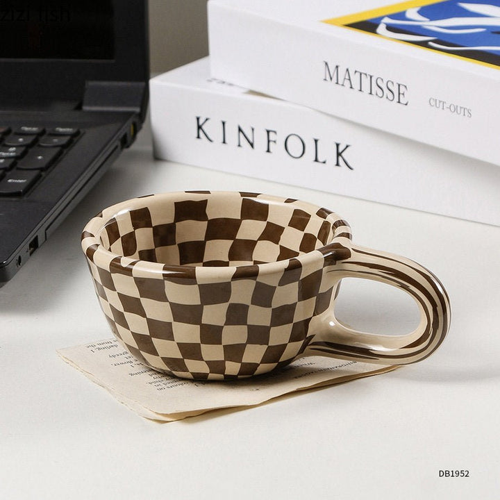 BowLift | Ceramic mug with irregular checkerboard pattern