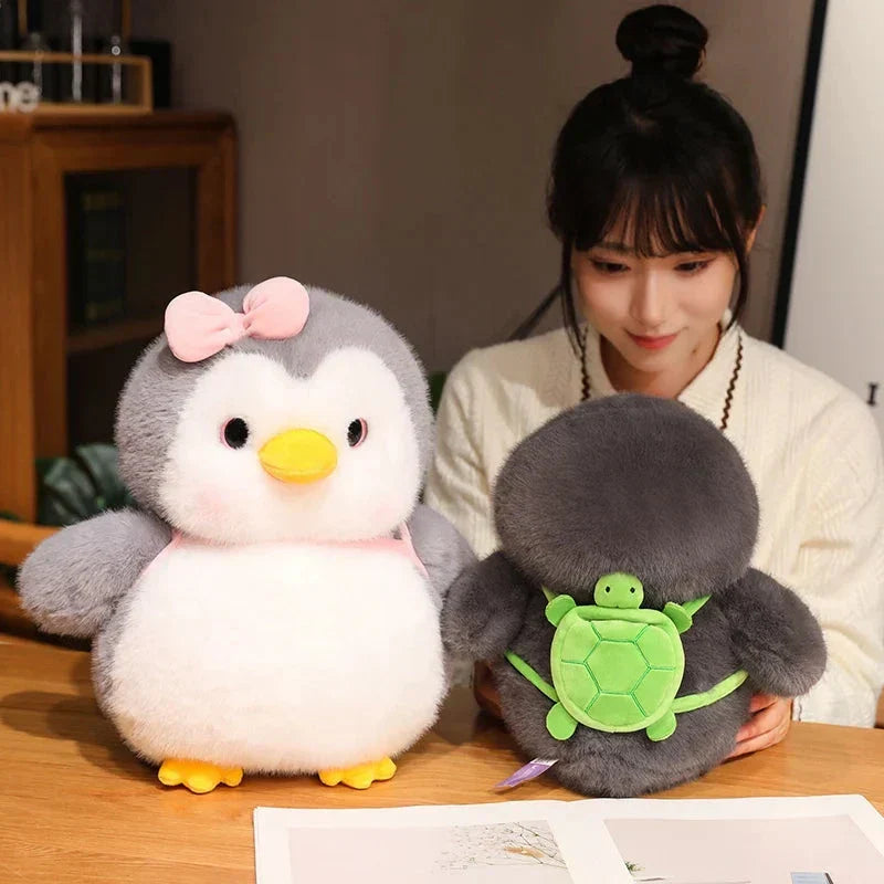 BowLift | Fluffy Gray Penguin Plushie with Turtle Backpack