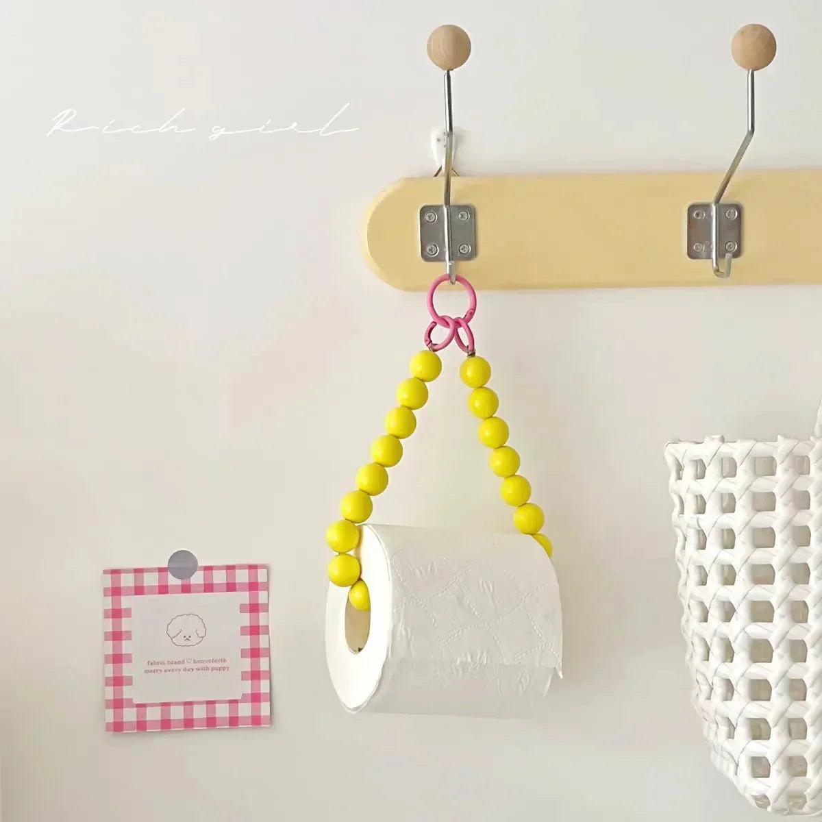 BowLift | Innovative hanging toilet paper holder with beads