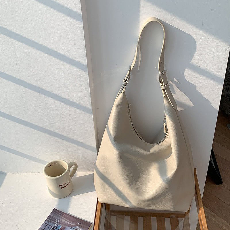 BowLift | PUFFYPOUCH – Soft PU Leather Dumpling Tote for a Playful, Chic Look