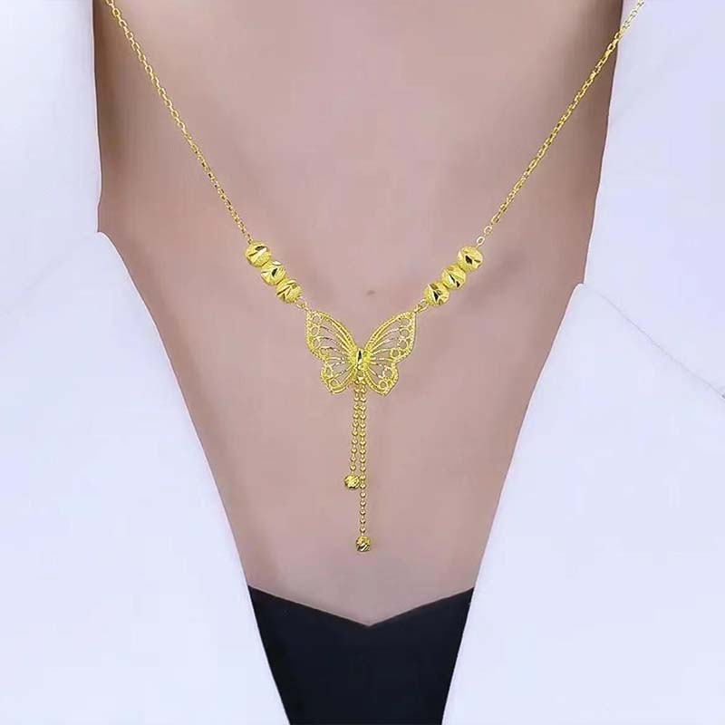 BowLift | Necklace with gold-colored butterfly with tassels