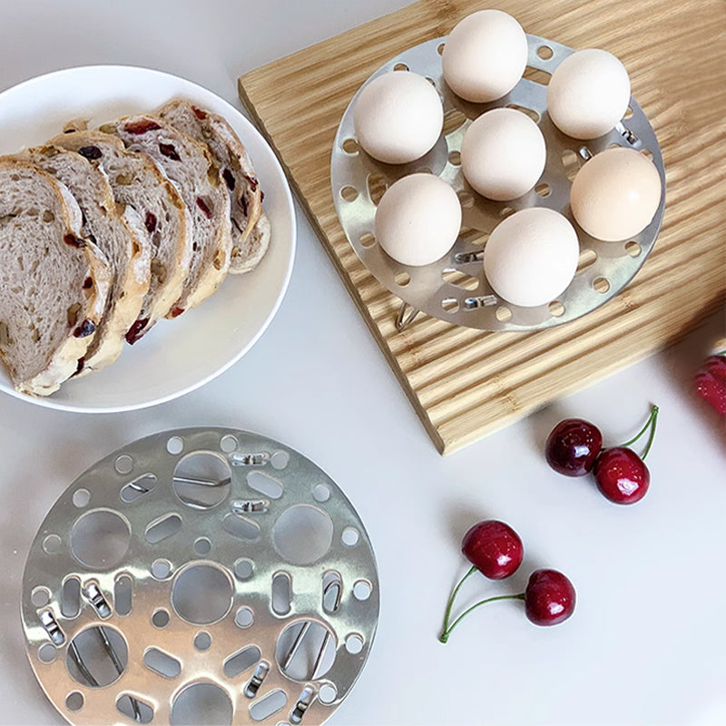 BowLift | Silver-colored steamer rack in stainless steel with support for cooking